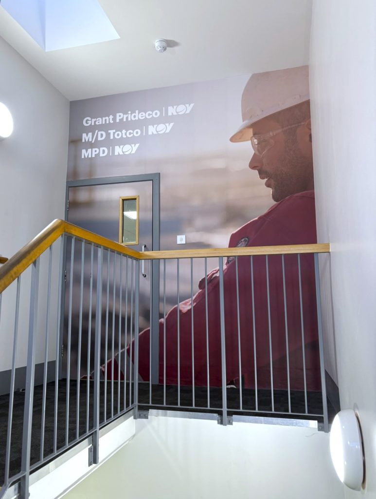 Stairwell display in NOV offices.