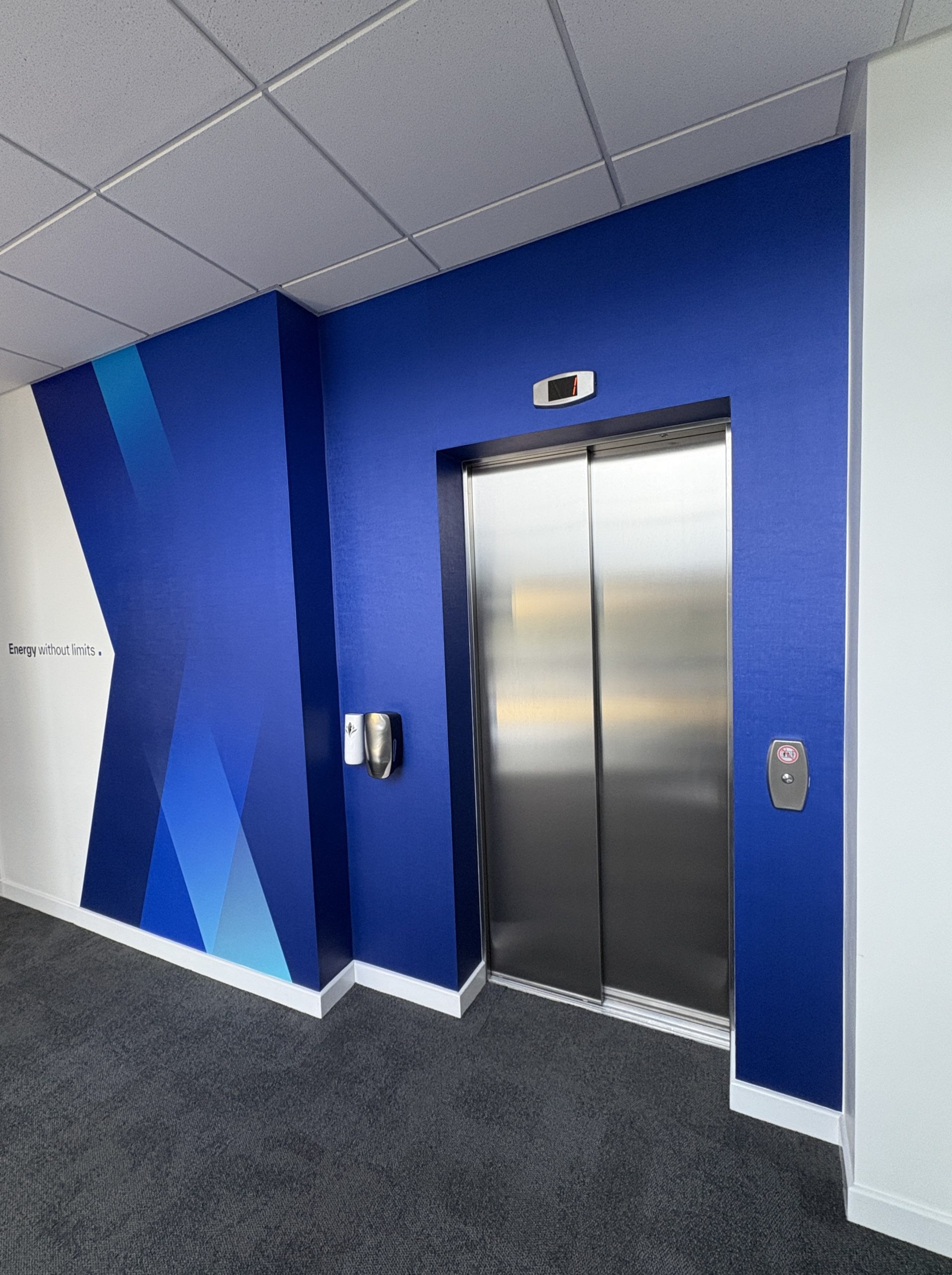 Dynamic geometric blue display installation at OEG.