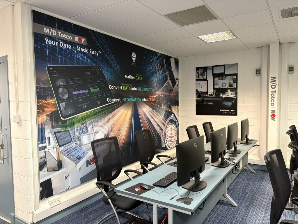 Image of NOV training desks set-up with computer screens.