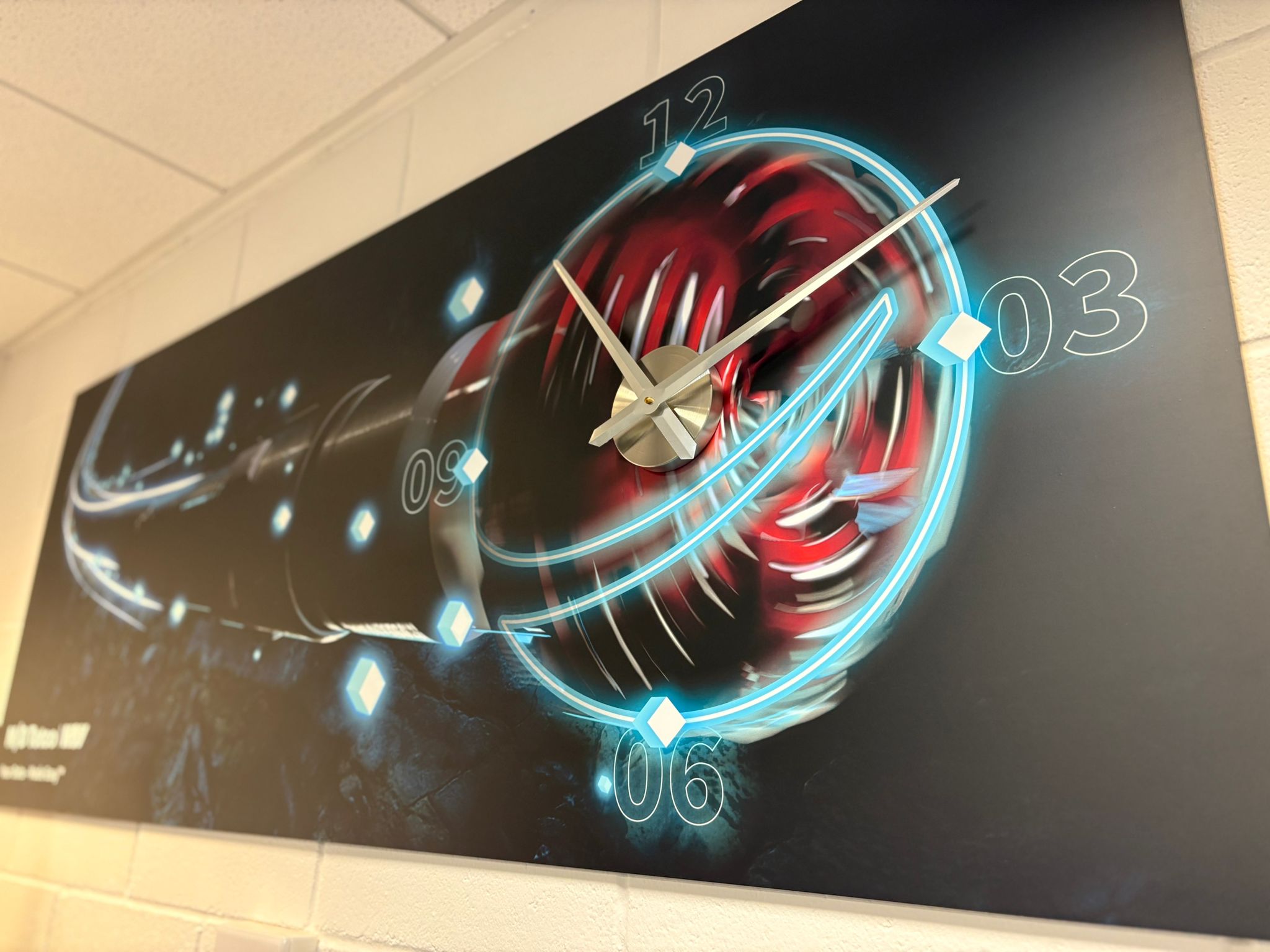 Image of bespoke TFS clock with NOV graphic.