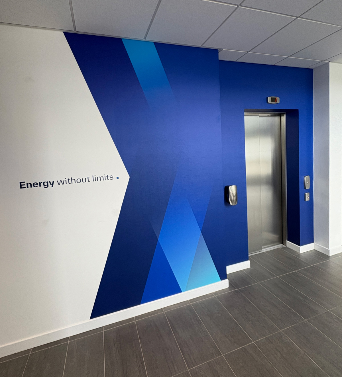 Dynamic geometric blue display installation at OEG.