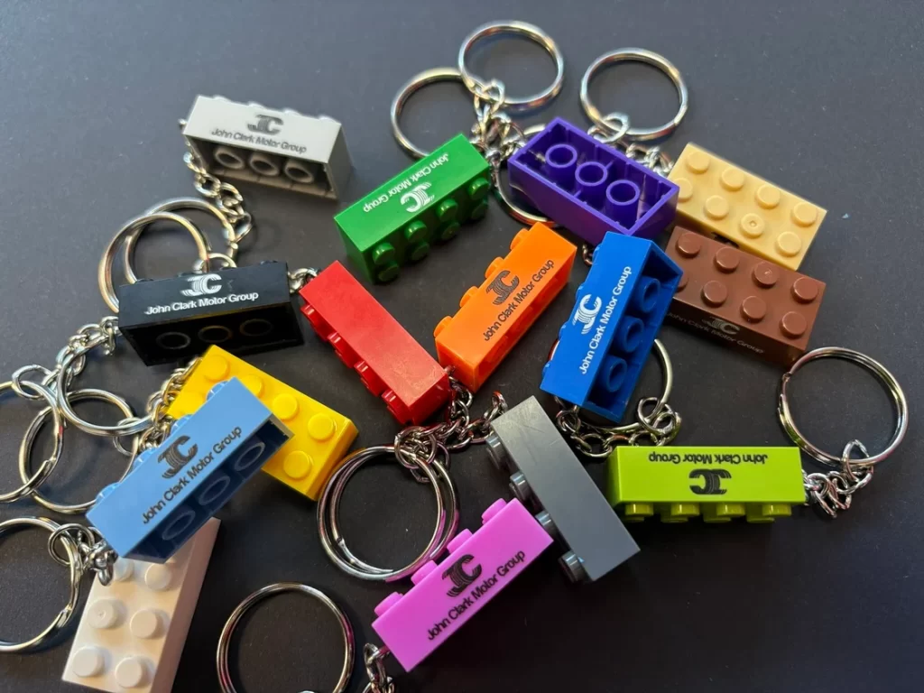 Image oof lego key rings with John Clark company logo printed.